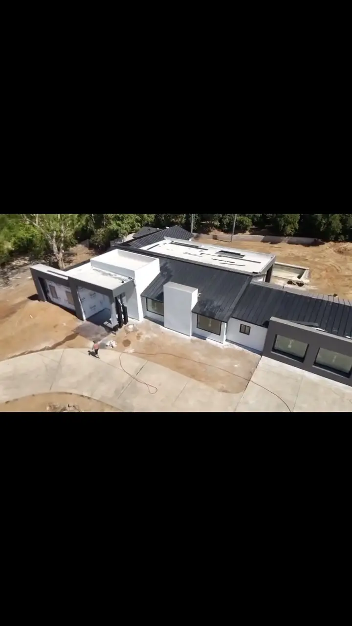 Aerial view of a custom home under construction: project by J.O. Construction, general contractor in Chino, CA