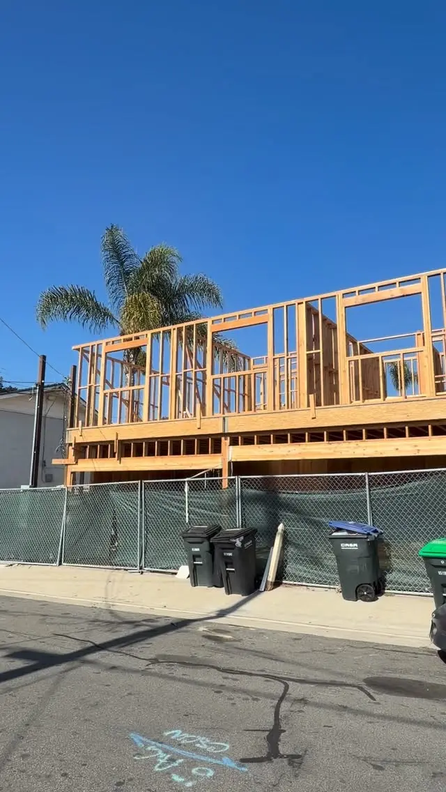 Multi-family duplex ADU in San Clemente, CA: second-story framing going up on a duplex adu
