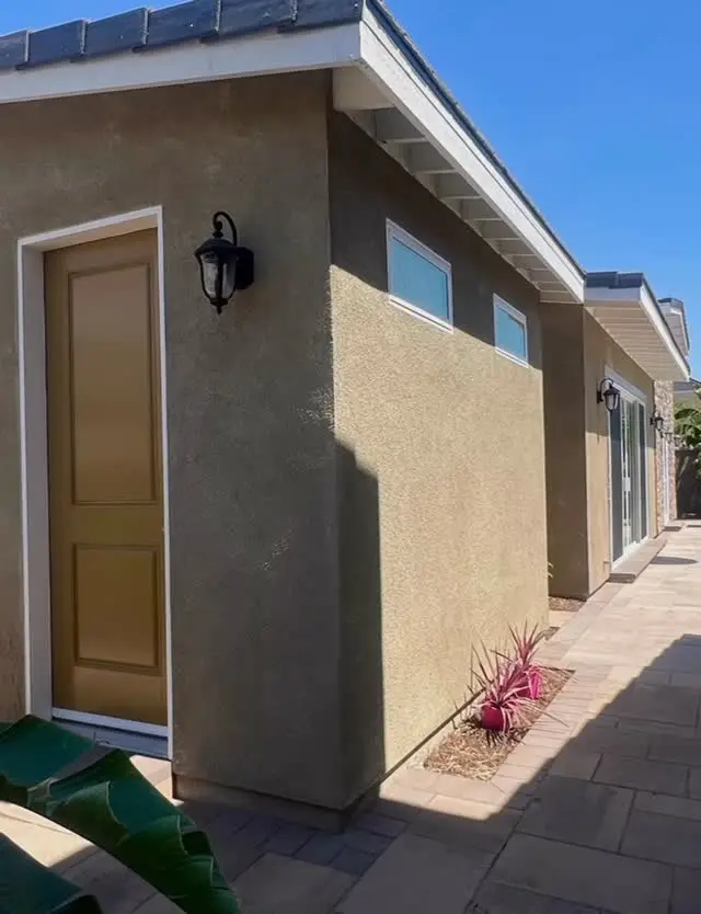 893 sq ft ADU and pool house, two phases in Fontana, CA: side entry of a detached adu and pool house