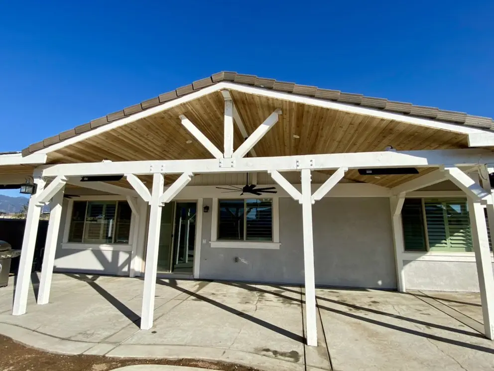 Open-beam wood patio cover on the back of a home, by J.O. Construction, additions and patio covers, CA